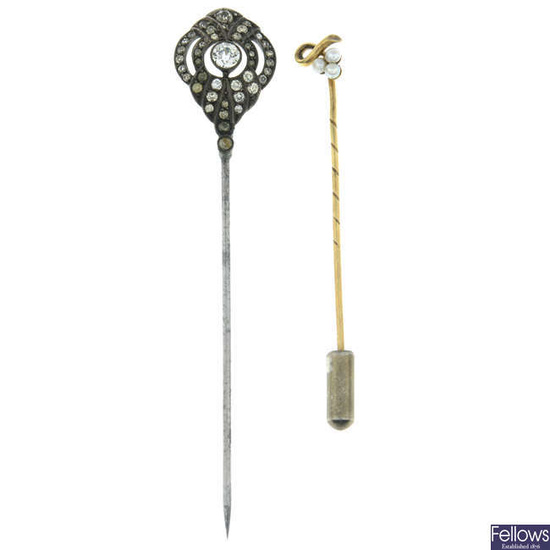 An early 20th century 15ct gold seed pearl trefoil stick pin, together with a similarly aged silver colourless paste stick pin.