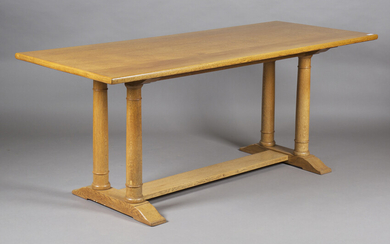 An early 20th century Heals pale oak Letchworth dining table, designed by Philip Tilden, the rectang