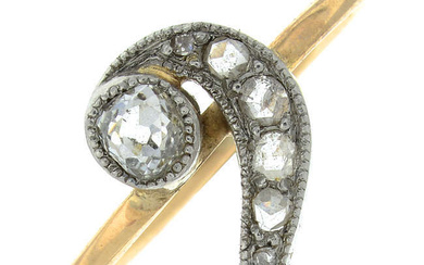 An old and rose-cut diamond dress ring, depicting a bass clef.