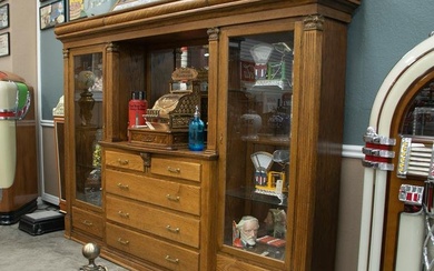 Antique double door oak Back Bar with seven drawers in front, bevel mirror center, area for cash