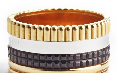 Boucheron: A “Quatre Classique Large” ring of 18k tri-coloured gold and brown PVD. Size 56. Ref. no. JGR00257–56. Serial no. N35128.