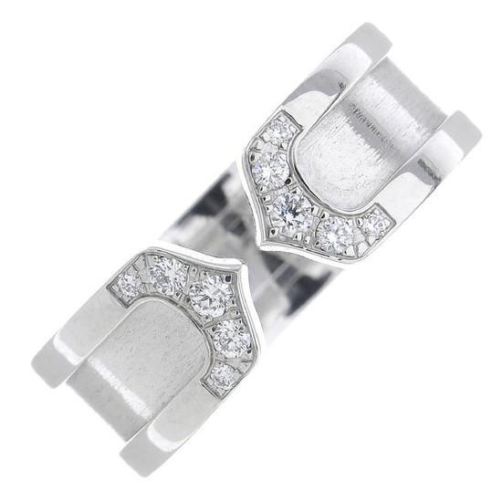 CARTIER - a diamond 'C de Cartier' ring. Designed as an