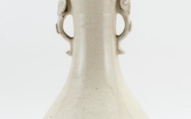 CHINESE CRACKLED CREAMWARE POTTERY VASE In baluster form, with elephant's-trunk handles and a raised floral band at base. Height 13"..