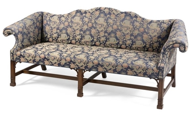 CHIPPENDALE-STYLE SOFA Mahogany frame. Deep blue Chinese-motif printed upholstery. Modified camel back. Nicely scrolled arms. Back h...