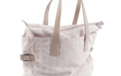 Chanel, a beige Travel Line bag