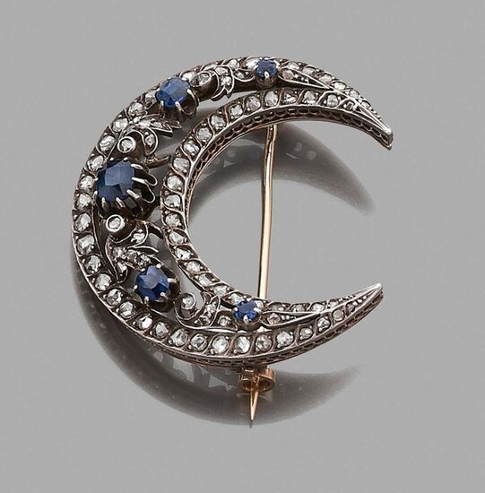 Crescent brooch in 750-thousandths gold and 925-thousandths silver decorated in...