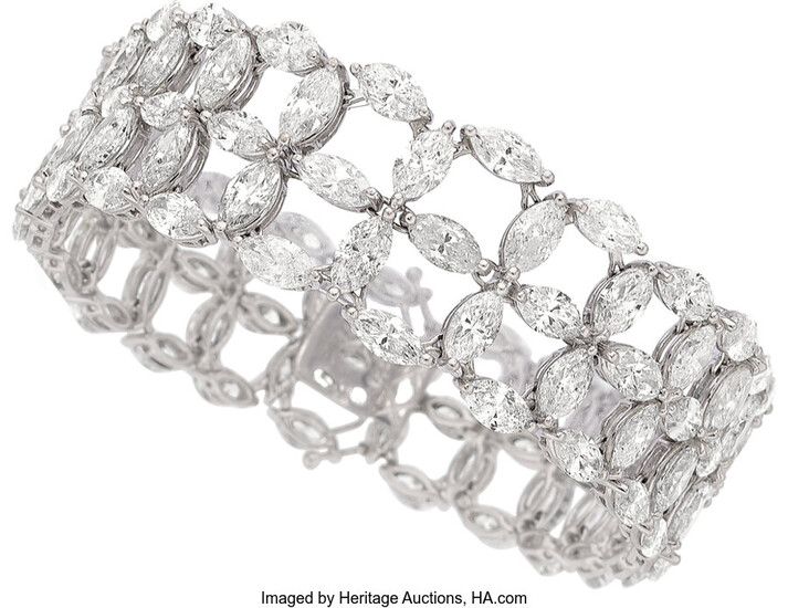 Diamond, White Gold Bracelet Stones: Marquise-shaped diamonds weighing a...