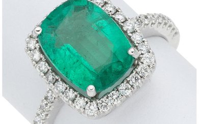 Emerald, Diamond, White Gold Ring The ring features a...