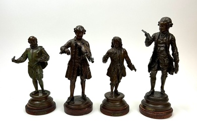 Ensemble de quatre statuettes en régule patiné comprenant : - Léon Grégoire (XIXe-XXe) Mozart au...