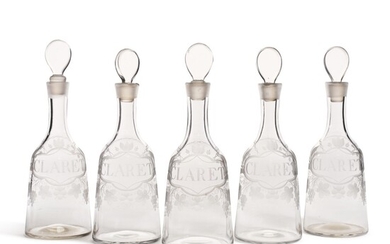 Five English engraved glass claret decanters, late 18th century