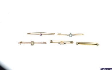 Five early 20th century gold brooches.