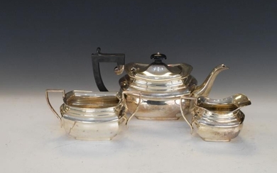George VI silver three piece tea service comprising: teapot,...