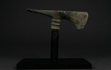 HEAVY BRONZE AGE BATTLE AXE ON STAND