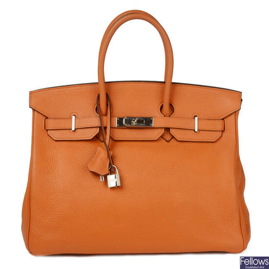 HERMÈS - a 2003 orange Togo Birkin 35 handbag.