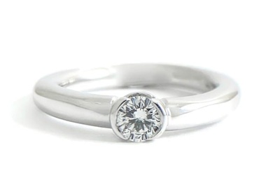Half Bezel Solitaire Diamond Ring