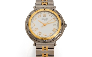 Hermès n° 251339, vers 2000 Une montre de dame en acier et acier doré à...