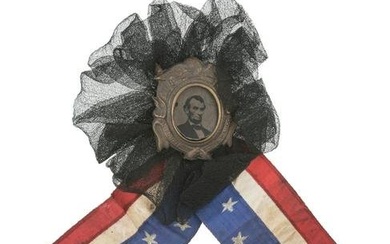 [LINCOLN, Abraham (1809-1865)]. Lincoln mourning cockade with ferrotype at center.