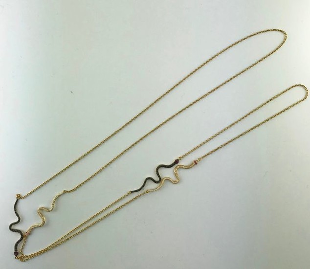 Long necklace in 750°/°° gold set with snakes...