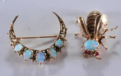 Lot of two 14k yellow gold and opal brooches. Bee