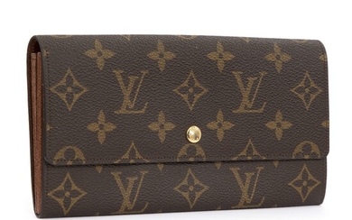 NOT SOLD. Louis Vuitton: A "Porte-Monnaie" wallet made of brown monogram canvas with gold toned...