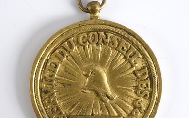 MEDAL OF THE SERVICE OF THE COUNCIL OF THE FIVE HUNDRED.In cast and gilt bronze attributed to Captain Laurence; decorated with a Phrygian cap on a radiating background surrounded by the inscription "Service du conseil des500", and below, in a...