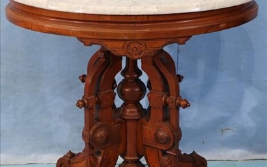 Oval walnut Victorian center table with marble