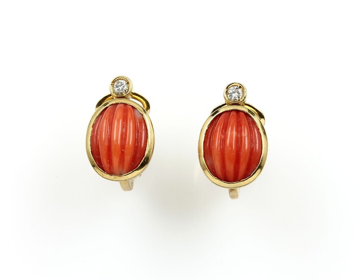 Pair of 18 kt gold ear clips...