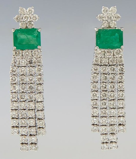 Pair of Platinum Dangle Earrings, with diamond mounted