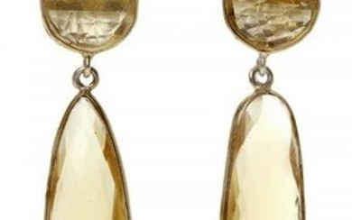 Pair of long earrings with movement in 18 Kts. yellow gold plated silver and yellow topaz. The