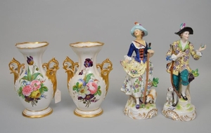 Pair of porcelain vases with floral motif (repair on