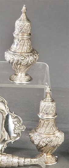 Pair of sterling silver salt shakers