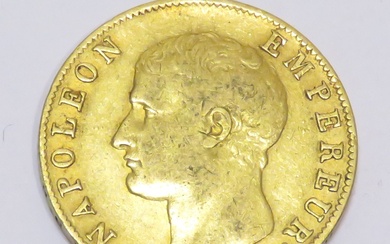 Pièce en or de de 40 Francs "Napoléon-Empereur, Tête nue" datée de l'An XIV, Atelier...