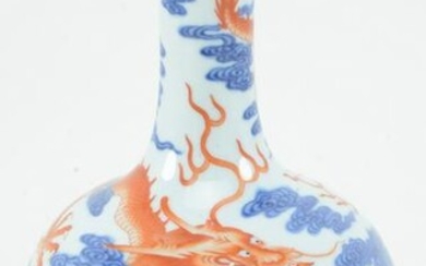 Porcelain vase. China. 20th century. Bottle form.