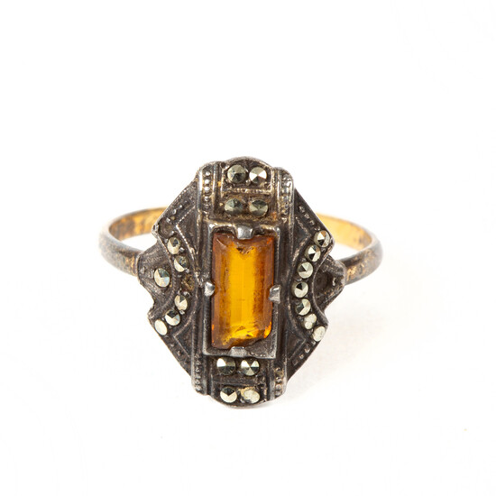 RING, 18k gold and silver with marcasite and faceted yellow stone, first half of the 20th century.