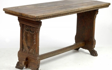 Rectangular carved walnut hunting table with a spacer and resting on claw feet. Side parts decorated with polychrome "Coats of arms", one with the "Crawling Lion" on a red and black striped background and the other with the "Tower" on a dark...
