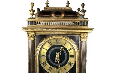 Religious clock in tortoiseshell veneer and brass, the annular dial with Roman numerals for the hours and Arabic numerals for the minutes, the days on a second ring. Signed GAUDRON PARIS on a cartouche in rinceaux under the dial. (Accidents and misses...