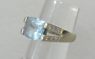Rhodium-plated white gold ring set with a topaz...