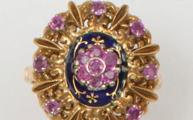 Rosace" ring in chiselled yellow gold, partially enamelled blue and decorated with golden flowers, set with faceted rubies. Finger size : 47. Gross weight : 5,9g.