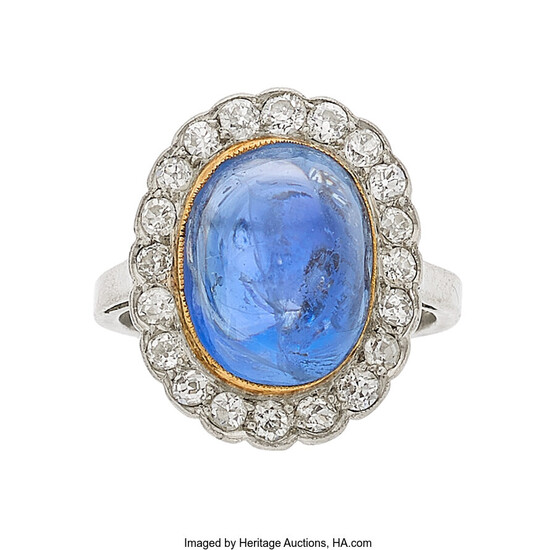 Sapphire, Diamond, Platinum, Gold Ring The ring features an...