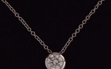 Single stone diamond pendant, in 18ct white gold, the...