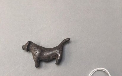 Stylized lion. Silver. Missing tail tip, traces of...