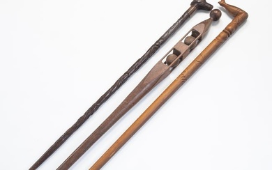 TWO FOLK ART CARVED WOOD CANES.