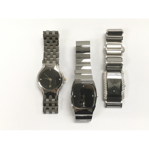 Three Tungsten watches with black dials.
