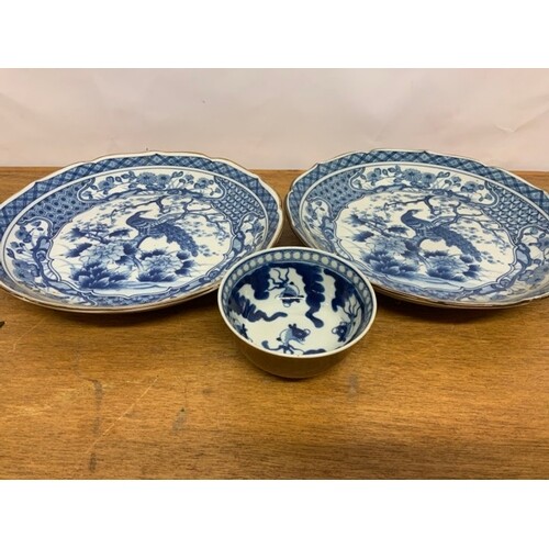 Three piece of blue and white oriental china, two plates and...