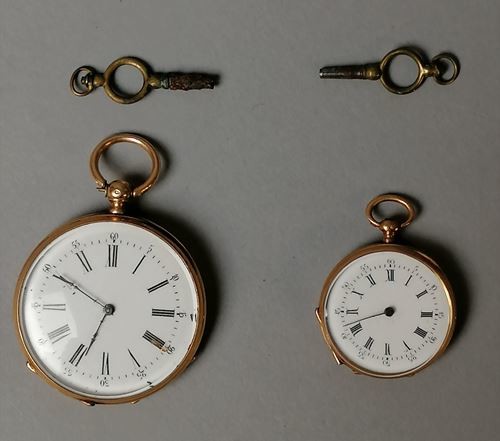 Two gusset watches, gold, one with a guilloche...