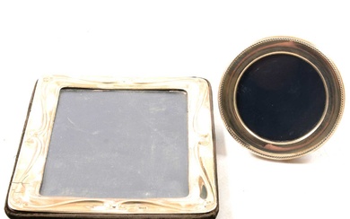 Two silver faced photograph frames