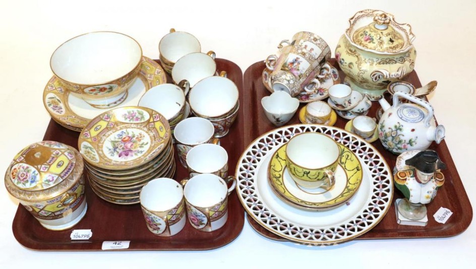 Two trays of 19th century Continental porcelain including: a gilt...