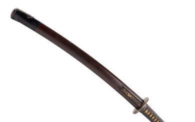 Un sabre japonais. Wakizashi. 19ème siècle. Lame en acier. En bois, en cuir gaufre, fourreau...