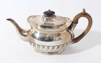 Victorian silver teapot of oval half reeded form with fruitwood knop and handle and engraved crest (London 1892), all at 20ozs