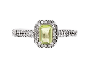 White gold ring, decorated with peridots and diamonds